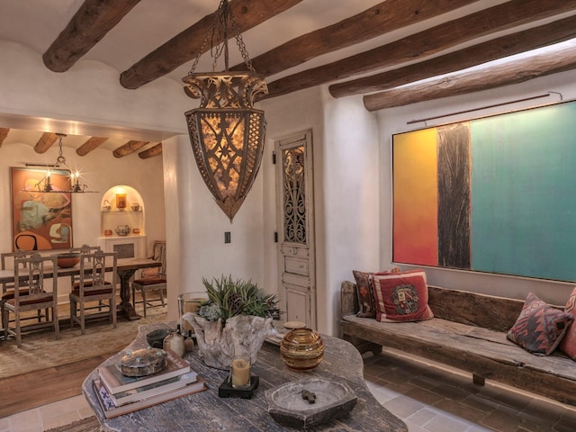 living room with beamed ceiling