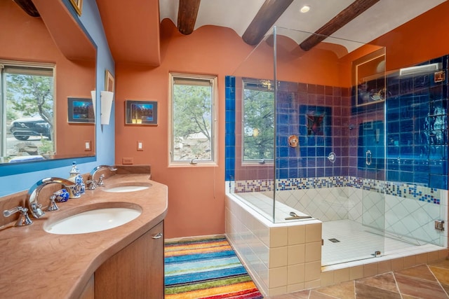 bathroom with vanity, beam ceiling, a shower with door, and tile patterned flooring