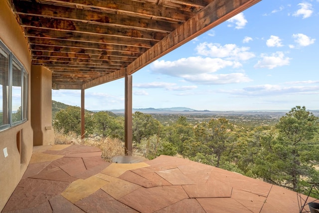 view of patio featuring a mountain view