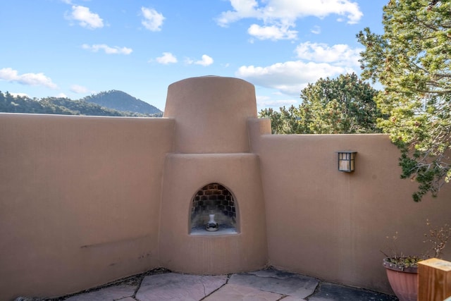 view of patio / terrace with a mountain view