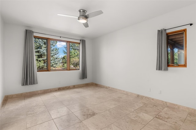 empty room featuring ceiling fan