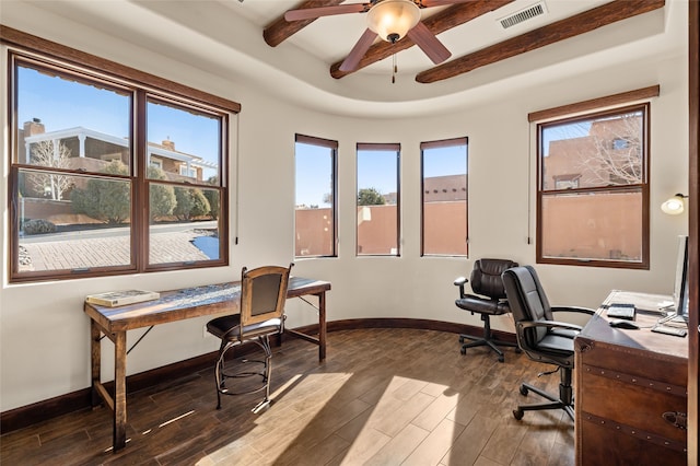 home office featuring beamed ceiling and ceiling fan