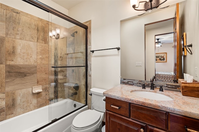 full bathroom with combined bath / shower with glass door, tasteful backsplash, toilet, and vanity