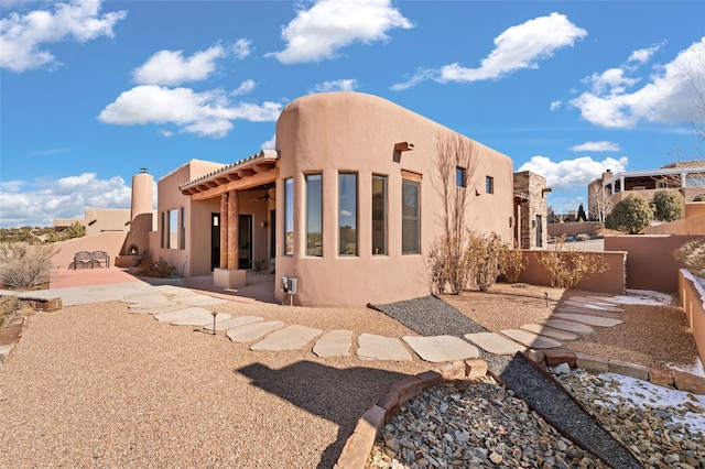 rear view of property with a patio