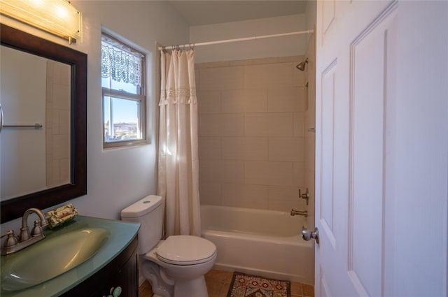 full bathroom featuring toilet, tile patterned flooring, shower / bathtub combination with curtain, and vanity