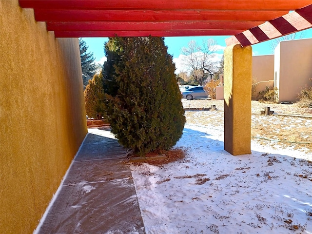 view of yard covered in snow