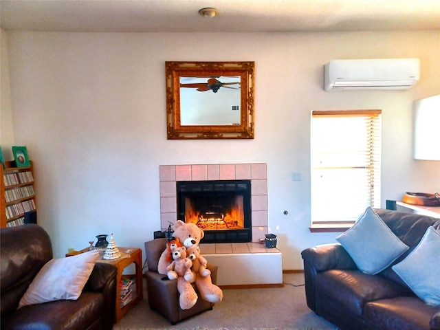 carpeted living room with a wall unit AC and a tile fireplace