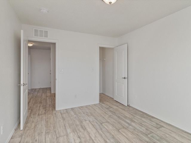 3110 Floras Del Sol, Santa Fe, NM 87507 - unfurnished room featuring light hardwood / wood-style floors
