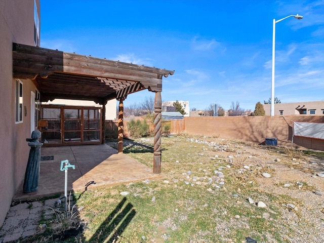 3110 Floras Del Sol, Santa Fe, NM 87507 - view of yard featuring a patio area