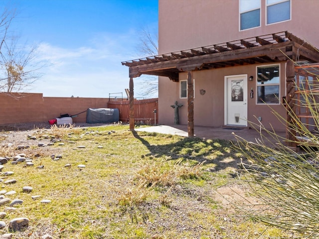 3110 Floras Del Sol, Santa Fe, NM 87507 - exterior space with a patio area and a lawn