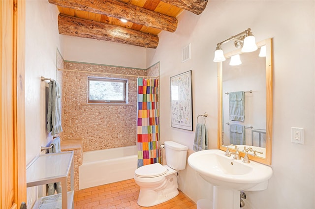 full bathroom featuring sink, wood ceiling, beam ceiling, toilet, and shower / bath combo with shower curtain