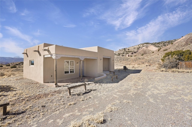 exterior space with a mountain view