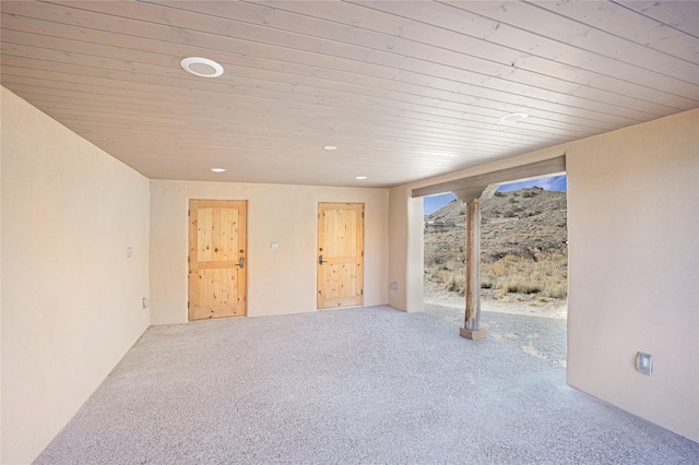 interior space with wood ceiling