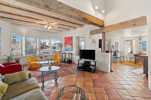 tiled living room featuring beam ceiling and ceiling fan