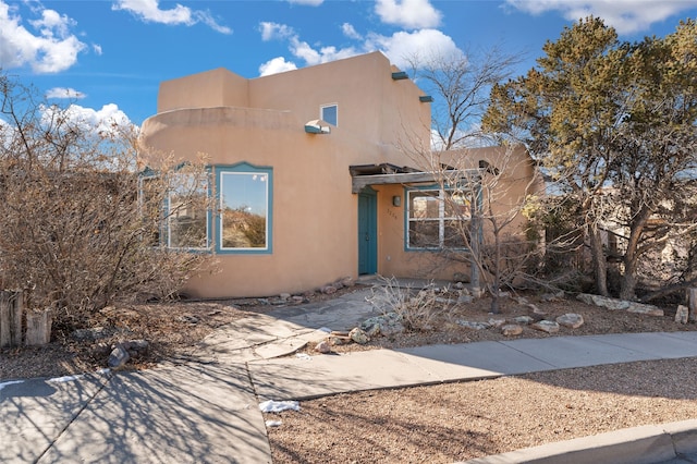 view of adobe home