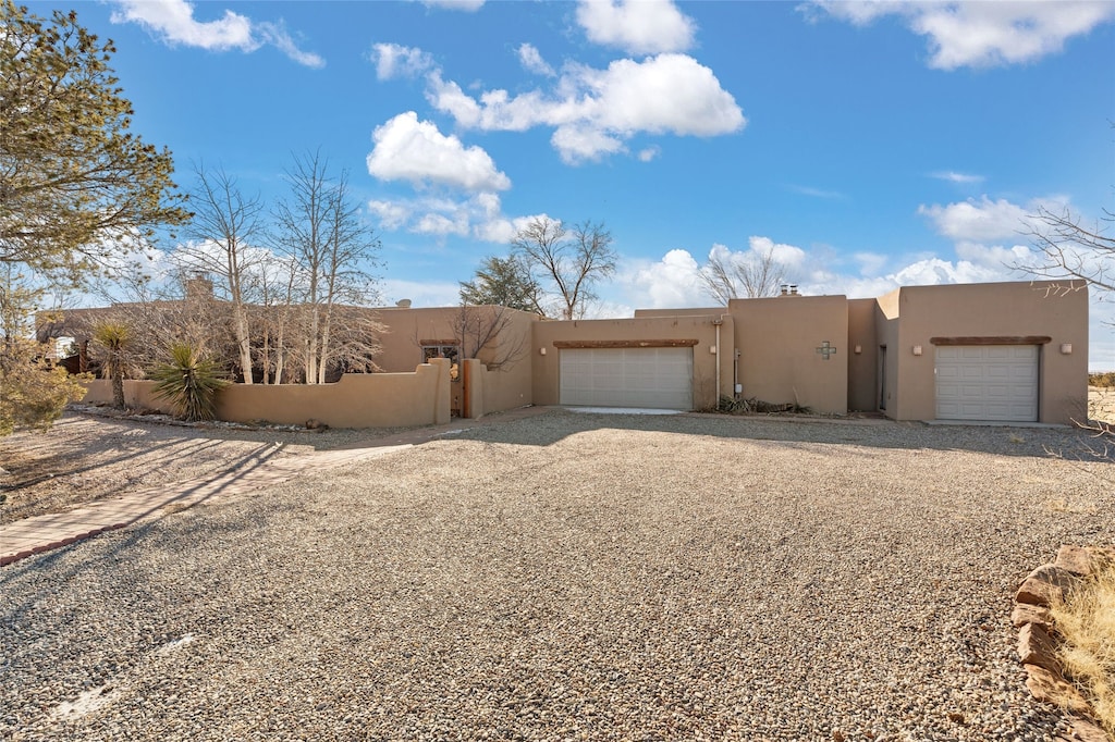 adobe home with a garage