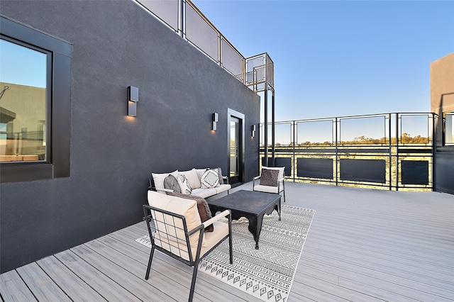 deck featuring an outdoor living space