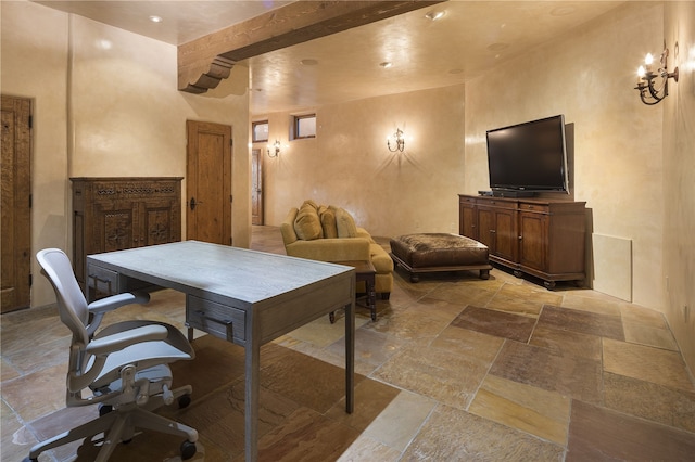 home office with beam ceiling