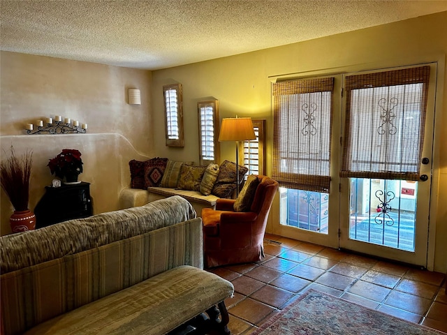 living room with a textured ceiling