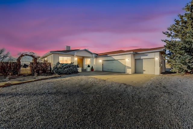 view of front of property featuring a garage