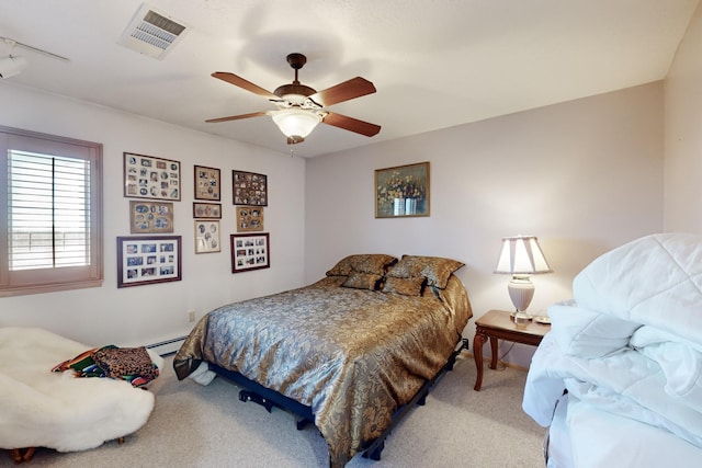 carpeted bedroom featuring ceiling fan