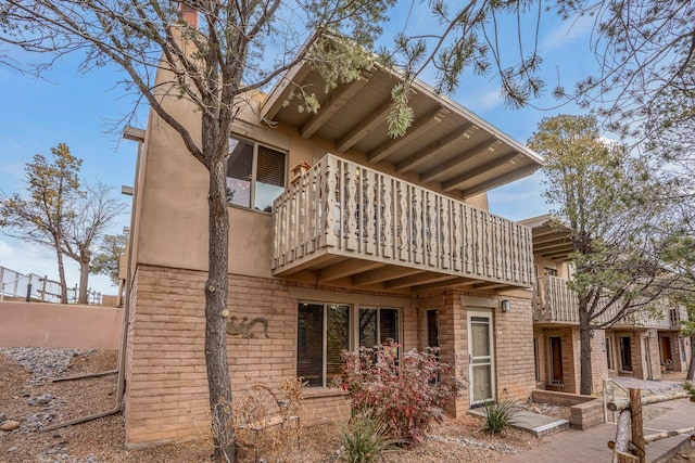 exterior space with a balcony