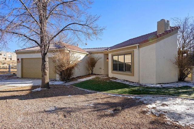 exterior space with a garage