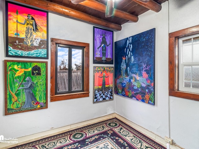 interior space with wood ceiling and beamed ceiling