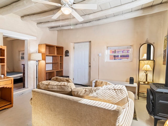 bedroom with concrete floors, beamed ceiling, and wooden ceiling