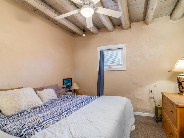 carpeted bedroom with wood ceiling, ceiling fan, and beamed ceiling