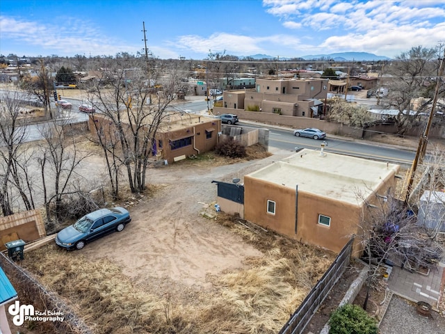 birds eye view of property featuring a mountain view