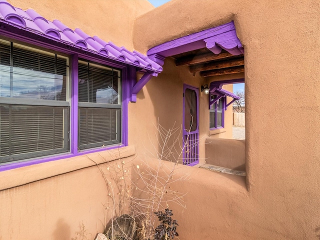 exterior space featuring stucco siding