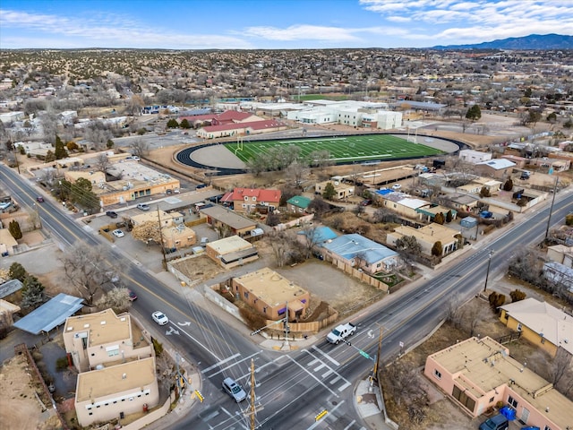 birds eye view of property featuring a mountain view