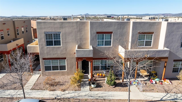 adobe home with a mountain view