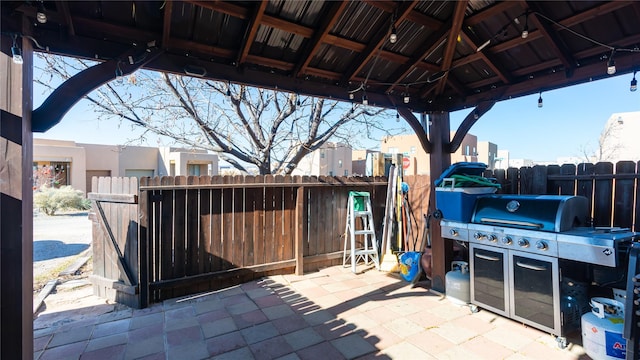 view of patio featuring a gazebo and grilling area