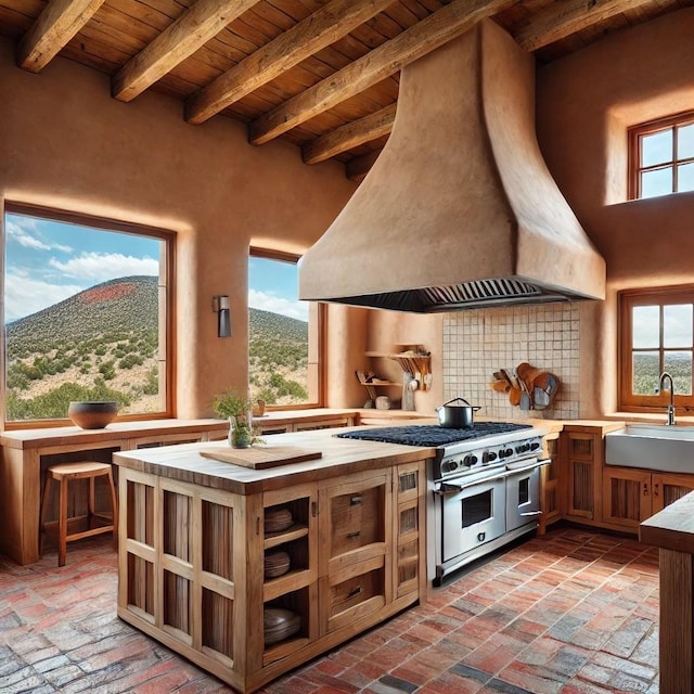 kitchen featuring sink, wood ceiling, custom range hood, beamed ceiling, and range with two ovens