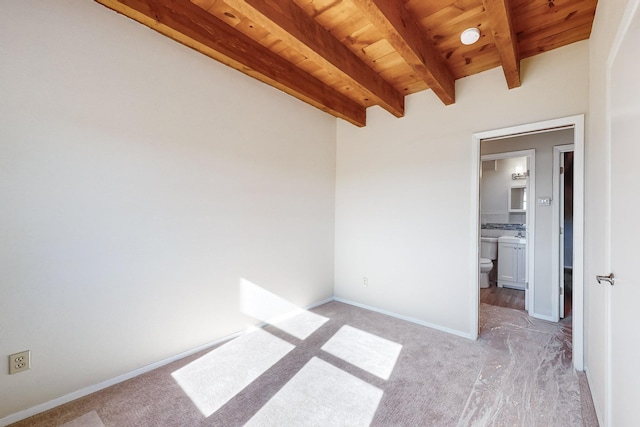 interior space with wood ceiling and beam ceiling