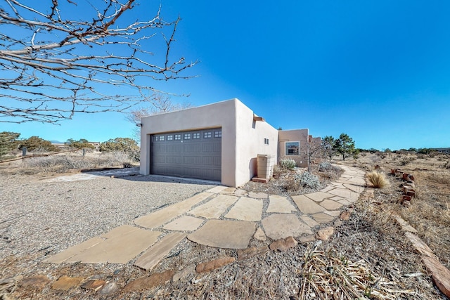 view of home's exterior featuring a garage