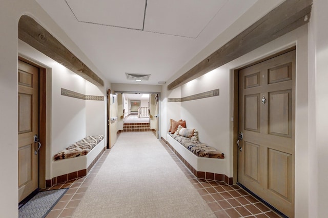 hallway featuring carpet floors