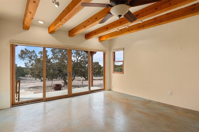 unfurnished room with beam ceiling, concrete flooring, and ceiling fan