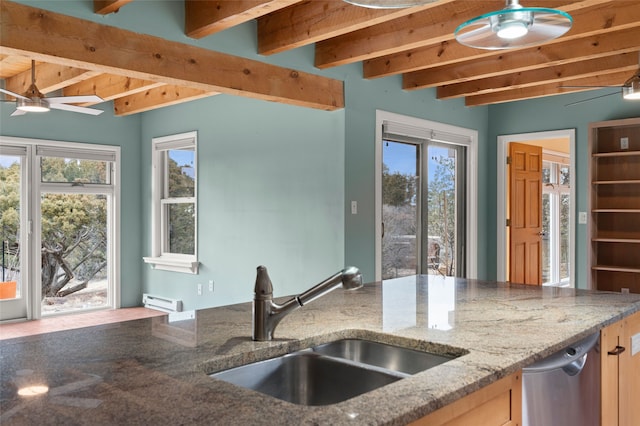 kitchen with beamed ceiling, dishwasher, sink, ceiling fan, and plenty of natural light