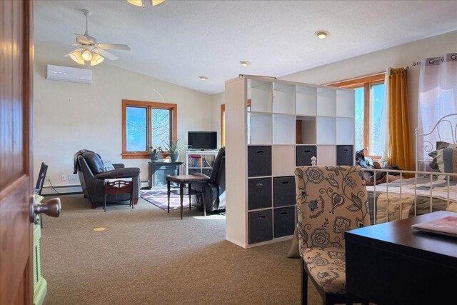 interior space with a baseboard heating unit, vaulted ceiling, an AC wall unit, and a textured ceiling