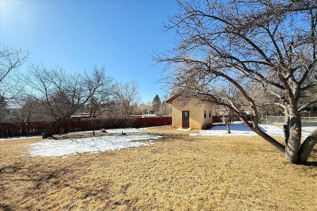 view of yard covered in snow