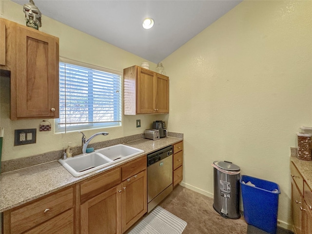 kitchen featuring vaulted ceiling, dishwasher, and sink