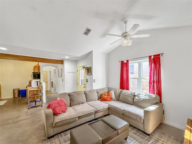 living room featuring vaulted ceiling and ceiling fan