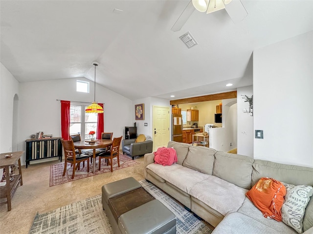 carpeted living room featuring lofted ceiling and ceiling fan