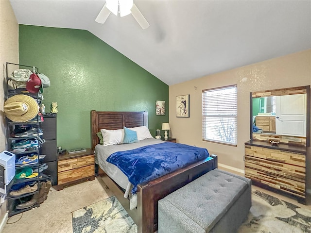 bedroom featuring lofted ceiling and ceiling fan