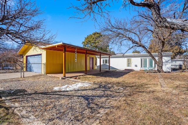 rear view of house with a carport