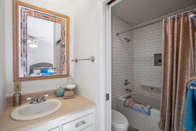 full bathroom featuring shower / bath combination with curtain, vanity, and toilet