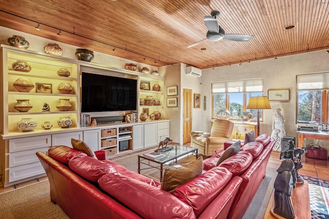 living room with wood ceiling, plenty of natural light, rail lighting, and a wall mounted AC